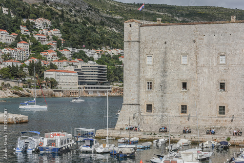 Landscape View Of Old Town Dubrovnik (UNESCO Cultural Heritage) With Beautiful Traditional Buildings, Squares, Churches, Harbor And Islands, Croatia photo