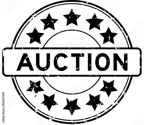 Grunge black word auction with star icon round rubber seal stamp on white background