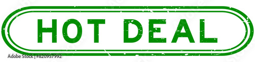 Grunge green hot deal word rubber seal stamp on white background