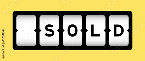 Black color in word sold on slot banner with yellow color background