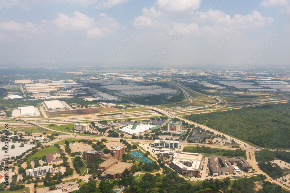 Commercial buildings and highway intersections in Dallas suburb, Texas. View from above