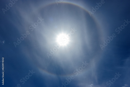Natural Phenomenon Solar Halo. Rainbow Around Sun with Clouds. Atmospheric Effect