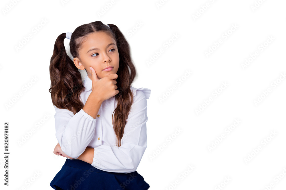 Nice cute tender adorable lovely stylish girl with curly pigtails in white formal blouse shirt and blue skirt, showing thoughtful gesture, hand to chin, copy-space. Isolated over grey background Nice cute tender adorable lovely stylish girl with curly pigtails in white formal blouse shirt and blue skirt, showing thoughtful gesture, hand to chin, copy-space. Isolated over grey background