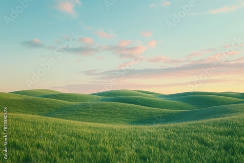 A field of vibrant green grass under a clear blue sky