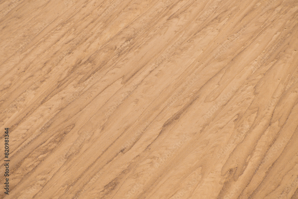 Sand mounds. Sandy natural background. Lines in the sand. Sand mounds. Sandy natural background. Lines in the sand.
