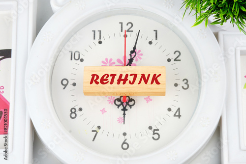 Rethink is shown using a text inscription on the wooden blocks photo