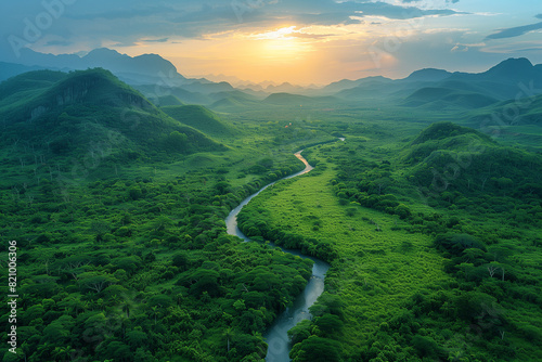 Aerial shot of a lush green valley at dusk