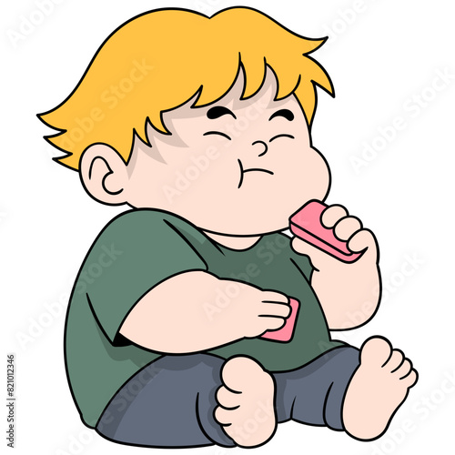 fat boy is sitting enjoying sweet biscuits