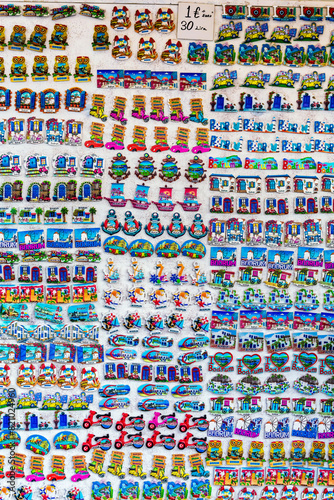 Wall of vibrant, colorful souvenir magnets from Bodrum, featuring popular Turkish themes and icons, perfect for travel and cultural promotions. Bodrum, Mugla, Turkey (Turkiye)