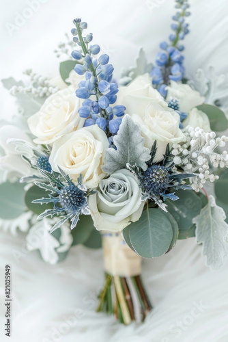 Small bouquet with white and blue flowers on white background