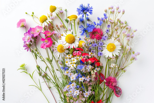 Small bouquet with wildflowers on white background © Venka