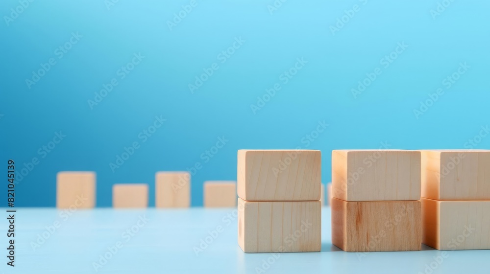 Wooden blocks on a blue surface, close up, simplicity and play, vibrant, Composite, minimalist backdrop Wooden blocks on a blue surface, close up, simplicity and play, vibrant, Composite, minimalist backdrop