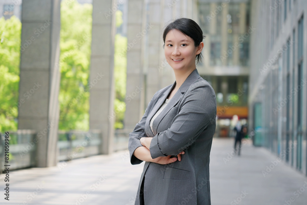 Confident Businesswoman Standing Outside Office Building