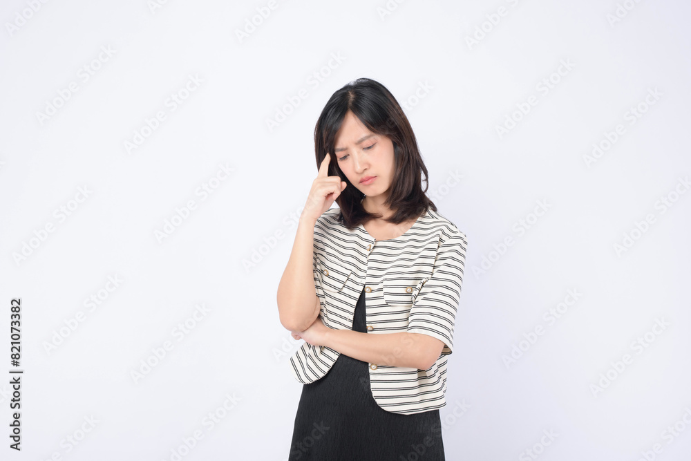 Asian woman with thinking pose against a white background.