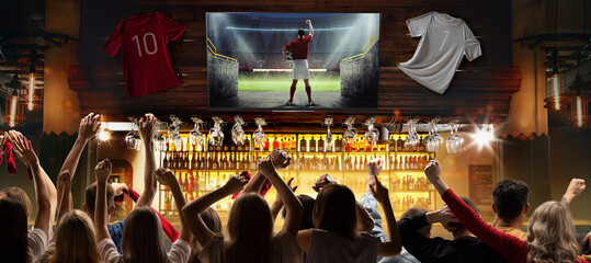 Game Excitement. Lively bar scene showing group of fans cheering favorite football team during live soccer match translation. Concept of championship cup final, competition, game, tournament