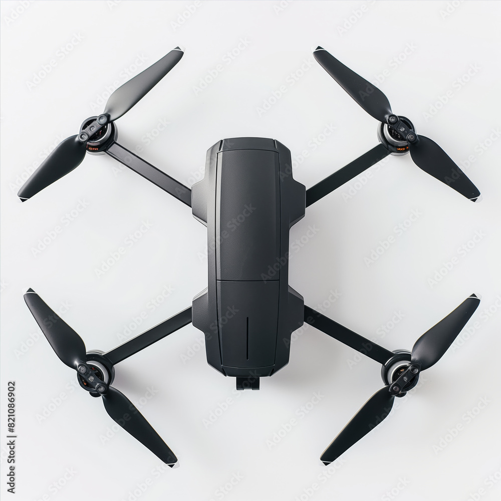 A top view of a black drone with static rotors in a white background. A top view of a black drone with static rotors in a white background.