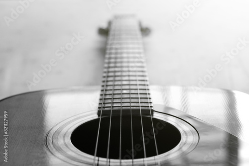 acoustic guitar macro abstract black and white , Used to play music and notes, for sing a song photo