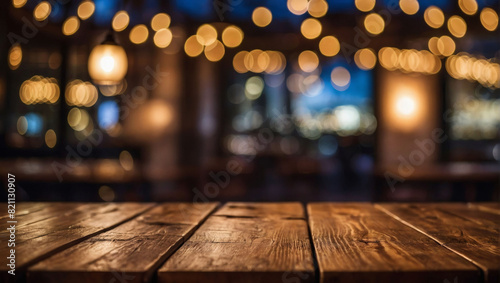 Wooden table with bokeh lights against a blurred restaurant backdrop