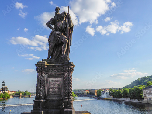 Statue of Saint Christopher - sculpture by Emanuel Max, installed on the south side of Charles Bridge photo