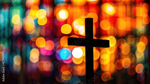 Defocussed cross in church, a serene prayer and religion concept by a colorful window