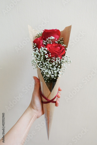 Three red rose mix with baby breath bouquet
