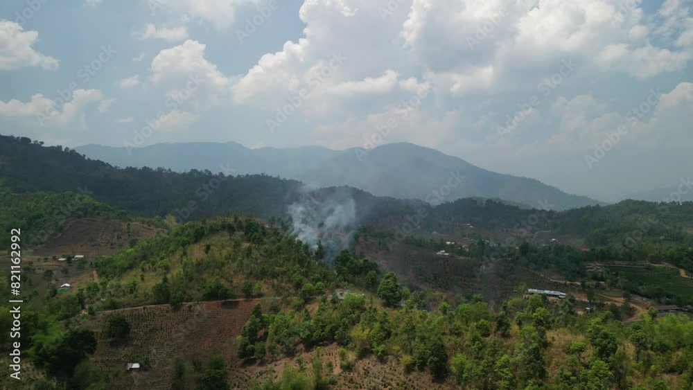 Aerial view of Burning crop field in Chiang Mai province Aerial view of Burning crop field in Chiang Mai province