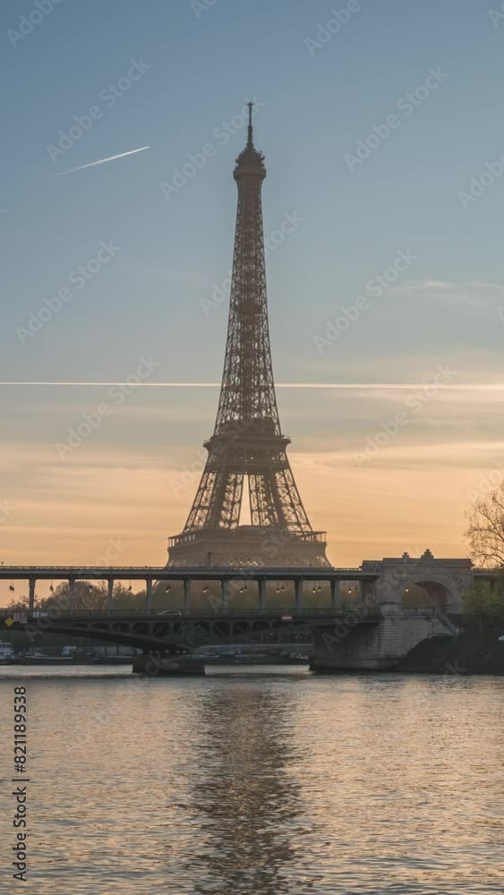 Paris France time lapse sunrise city skyline at Eiffel Tower and Seine River Bir-Hakeim Bridge (Vertical) Paris France time lapse sunrise city skyline at Eiffel Tower and Seine River Bir-Hakeim Bridge (Vertical)