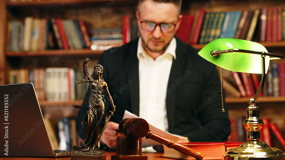A lawyer works with contract documents together with Fimida in the courtroom. Justice and law, lawyer, judge, concept. A lawyer works with contract documents together with Fimida in the courtroom. Justice and law, lawyer, judge, concept.