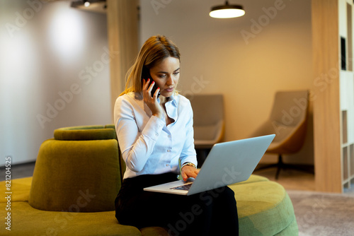 Businesswoman working on la...