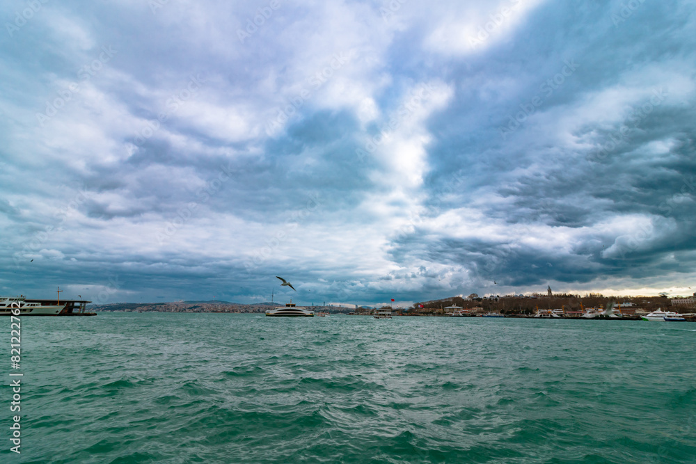 Istanbul view from Galata Bridge with dramatic clouds