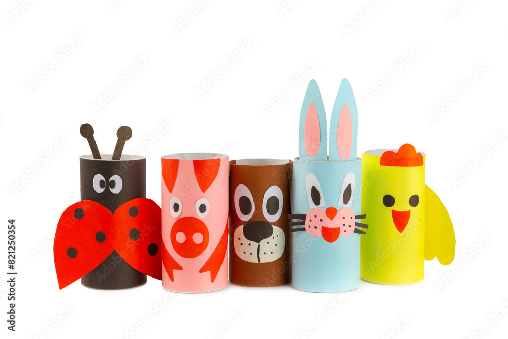 Obraz premium Toilet paper crafts isolated on white background. Kids crafts made with toilet paper roll. DIY. Handmade. Paper toys. Origami animals. Concept of children's educational games.