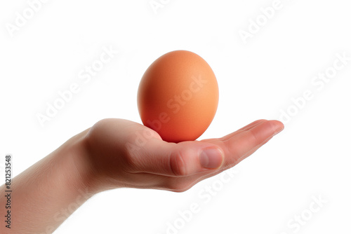 Conceptual photo of a hand holding an egg, isolated on a white background,