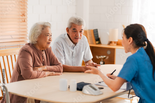 nursing home assistance in health insurance business concept, asian woman doctor or nurse caregiver support health care to elderly senior patient person, caretaker in medicals care recovery service