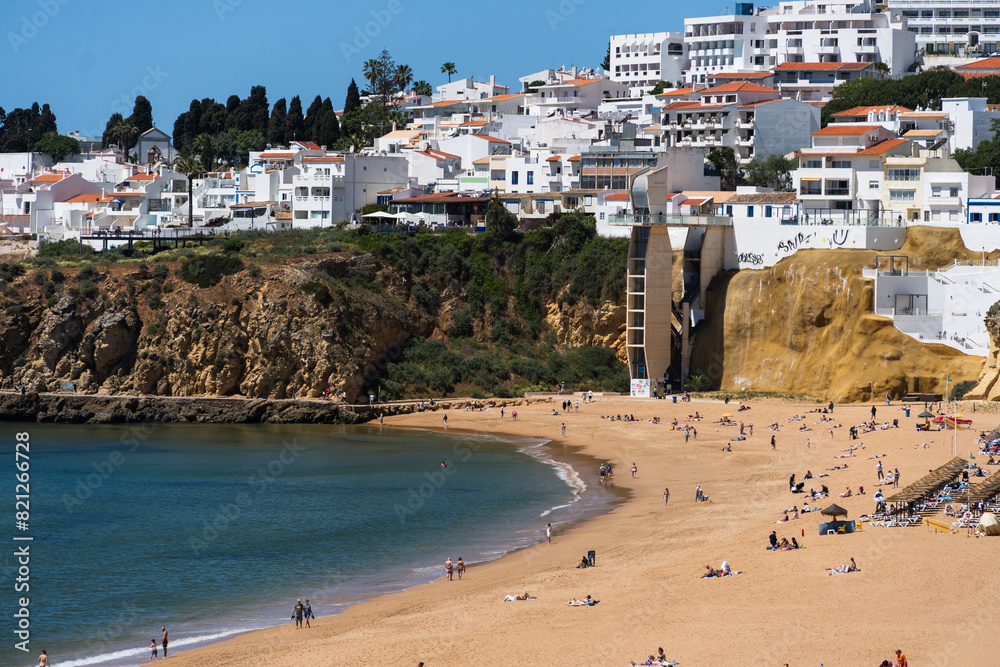 Praia do Peneco beach, Albufeira, Algarve, Portugal. Praia dos Pescadores beach. Fishermen, sunny day Praia do Peneco beach, Albufeira, Algarve, Portugal. Praia dos Pescadores beach. Fishermen, sunny day