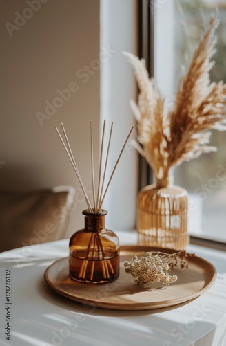 White Vase Filled With Feathers on Window Sill