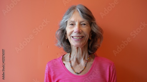 Woman Standing in Front of Orange Wall