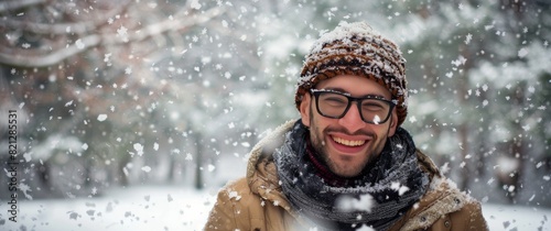 Man With Glasses and Hat in Snow