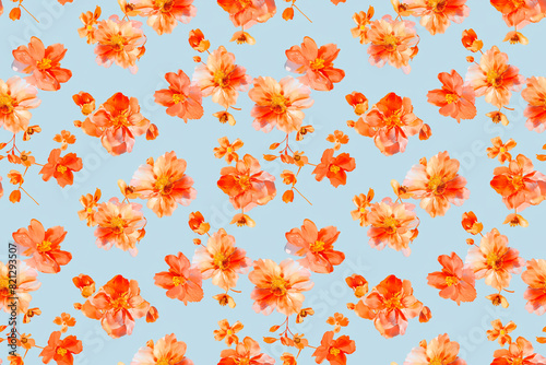 Bright floral seamless pattern with vibrant orange flowers on a light blue background, ideal for decoration and tile designs. This ornament brings a fresh and lively aesthetic to any space