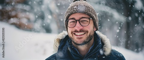 Man Wearing Glasses and Hat in Snow