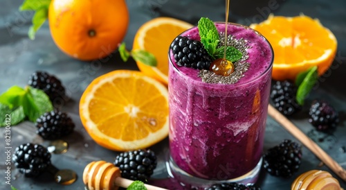 Glass of Berry Smoothie With Sliced Oranges