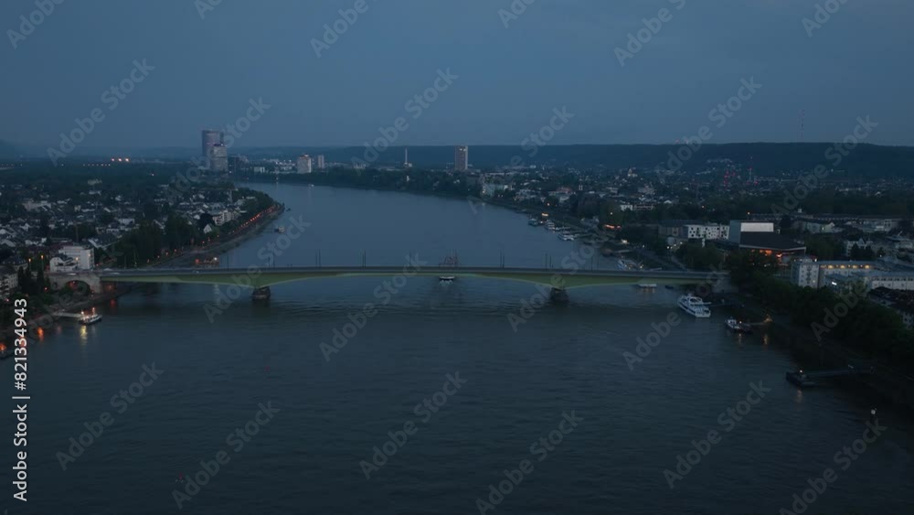 Aerial hyperlapse, time lapse of flying over the city of Bonn, Germany and the rhine river at sunset Aerial hyperlapse, time lapse of flying over the city of Bonn, Germany and the rhine river at sunset