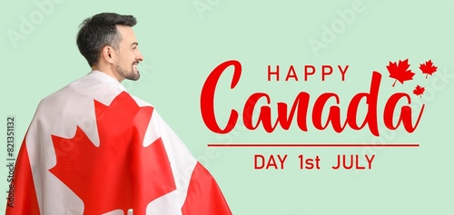Happy man with Canadian fla...
