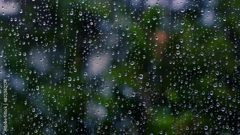 rain falling on the window surface rain falling on the window surface