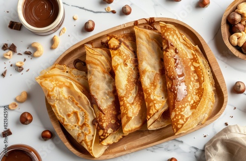 Wooden Tray With Crepes and Nuts