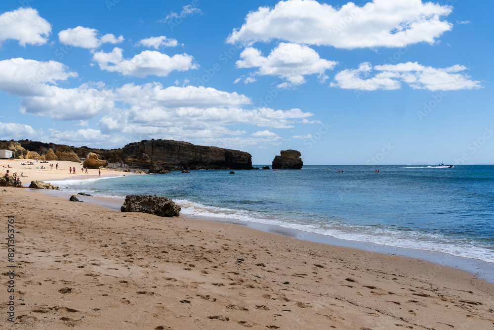 São Rafael beach, Albufeira, Algarve, Portugal. Sunny day. Rocks and cliffs on the beach. Crystal clear sea São Rafael beach, Albufeira, Algarve, Portugal. Sunny day. Rocks and cliffs on the beach. Crystal clear sea