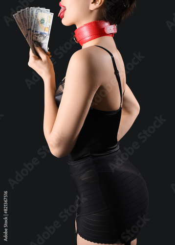 Young prostitute with dolla...
