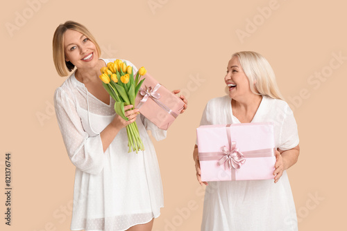 Adult woman greeting her mo...