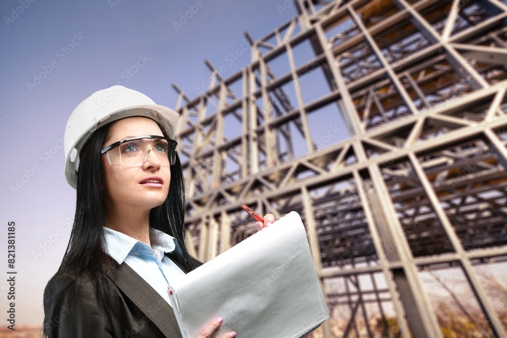 business person with a clipboard at construction site business person with a clipboard at construction site