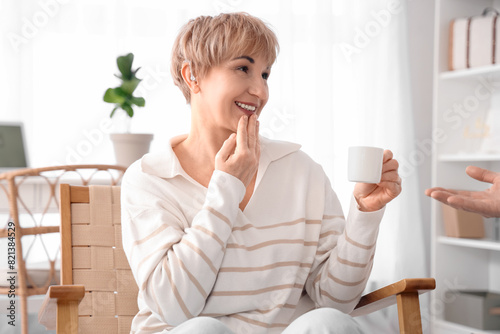 Mature deaf mute woman with...