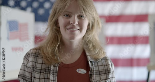 Young woman with red hair puts on 